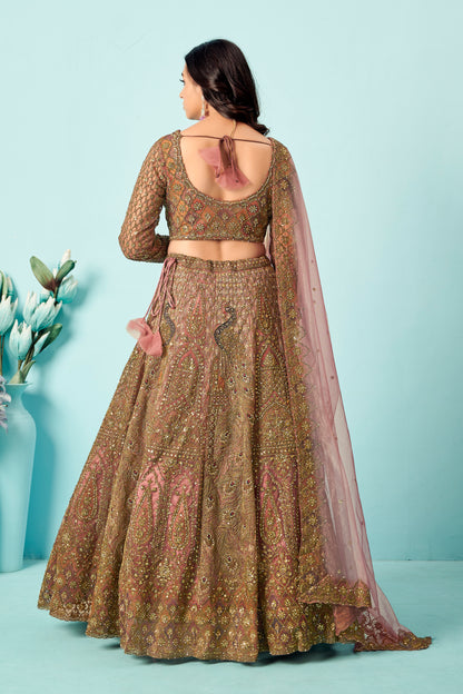 Antique rose-gold heavy embroidered lehenga set with matching blouse and net dupatta.