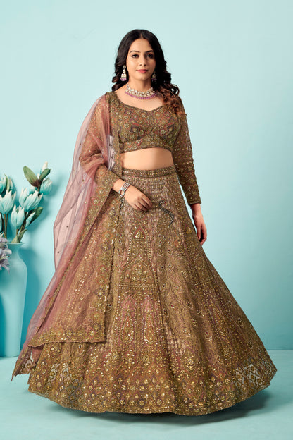 Antique rose-gold heavy embroidered lehenga set with matching blouse and net dupatta.
